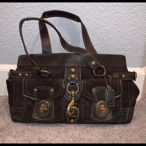 Coach Purse with buckles and colorful lining